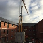 Potain IGO50 Self Erecting Tower Crane on an Apartment Complex