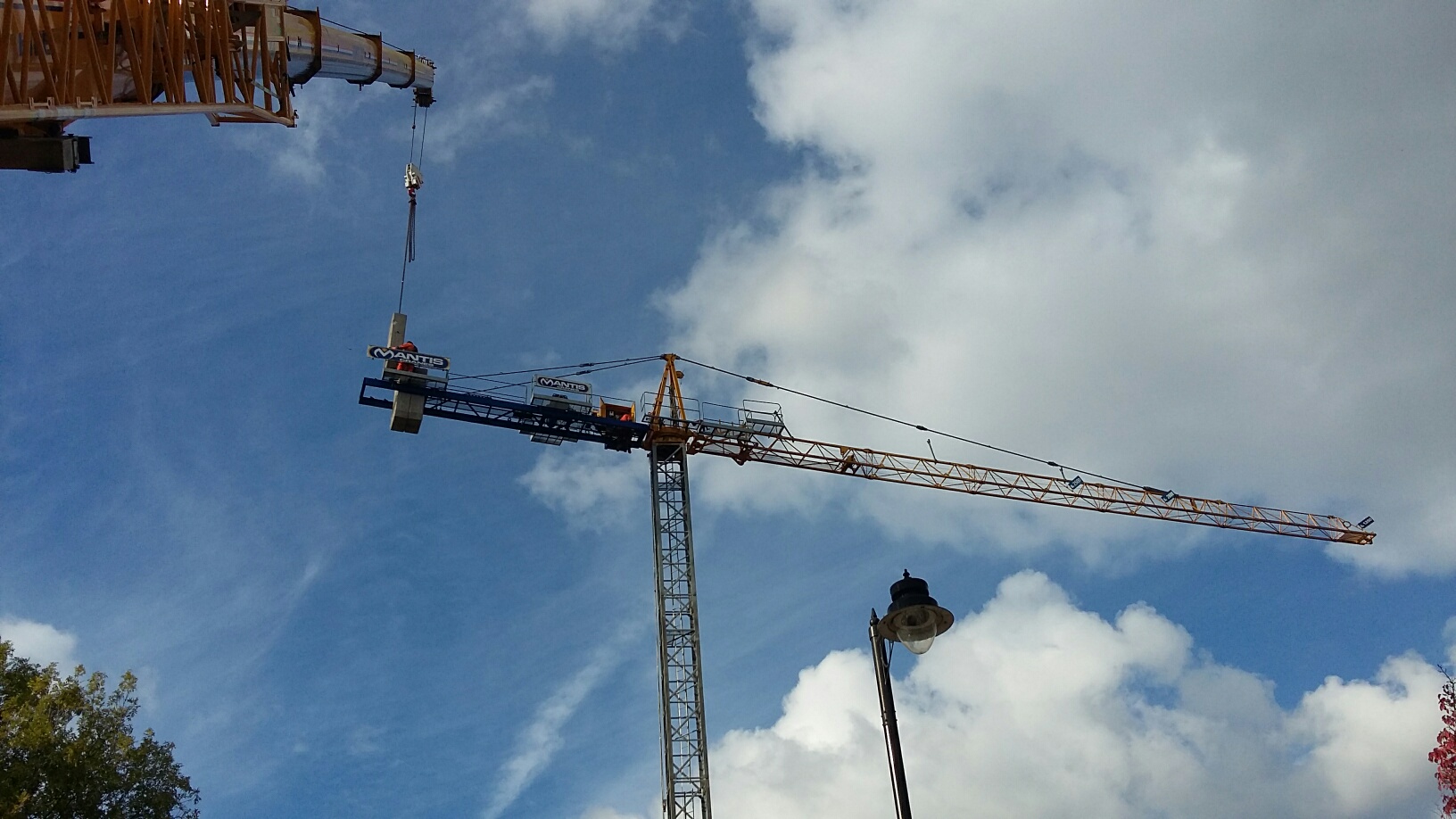 FM Gru 1035 Pedestrian Operated Tower Crane being erected at Islington
