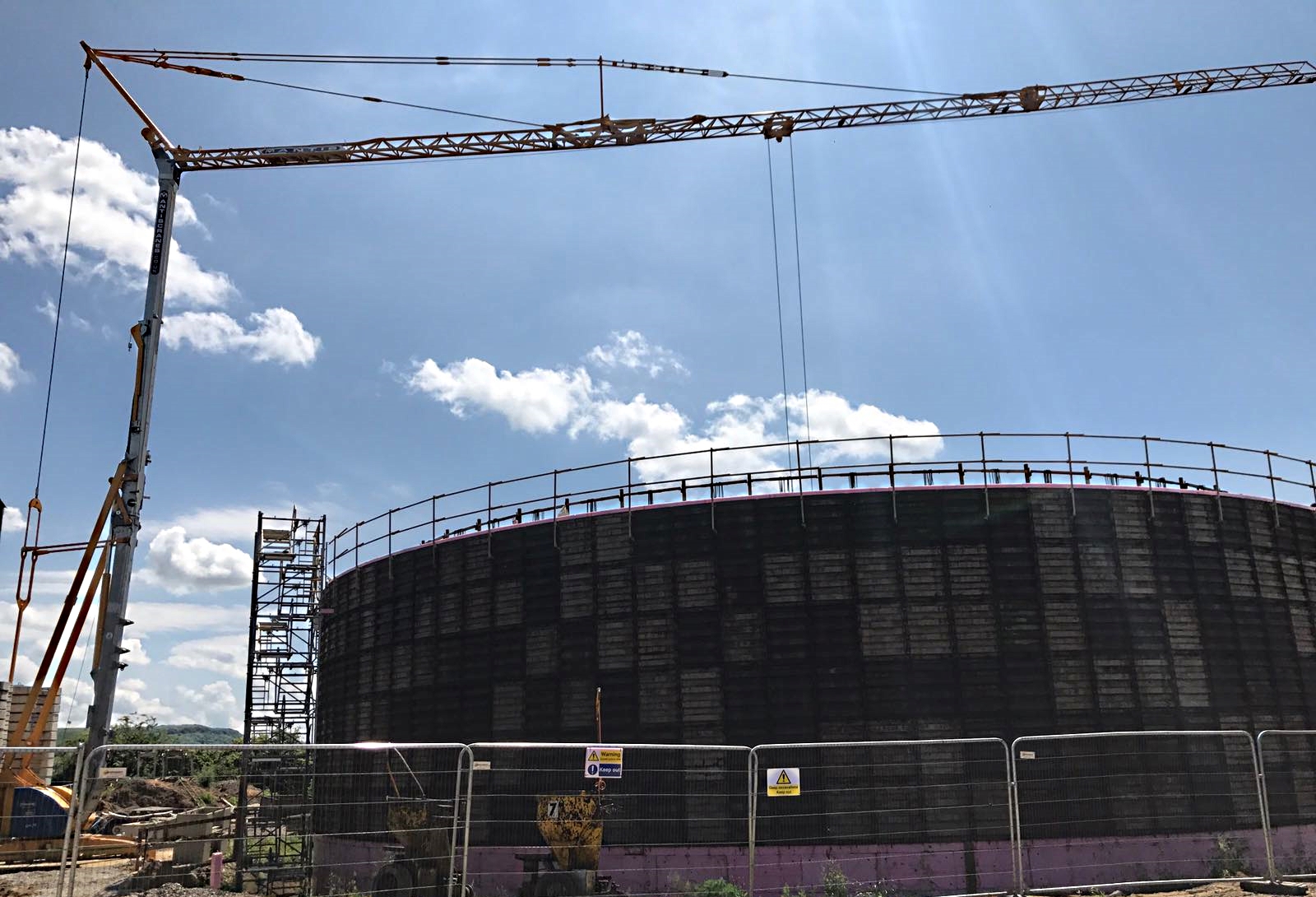 Self Erecting Tower Crane on a Bio Tank Project Self Erecting Tower Crane on a Bio Tank Project