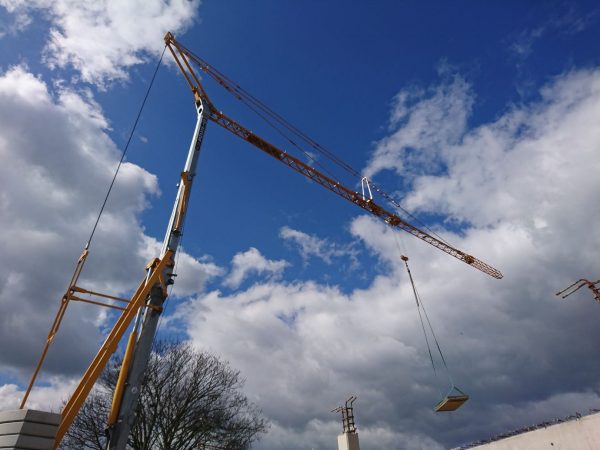 Self Erecting Tower Crane on a Sports Complex Project Image Self Erecting Tower Crane on a Sports Complex Project Image