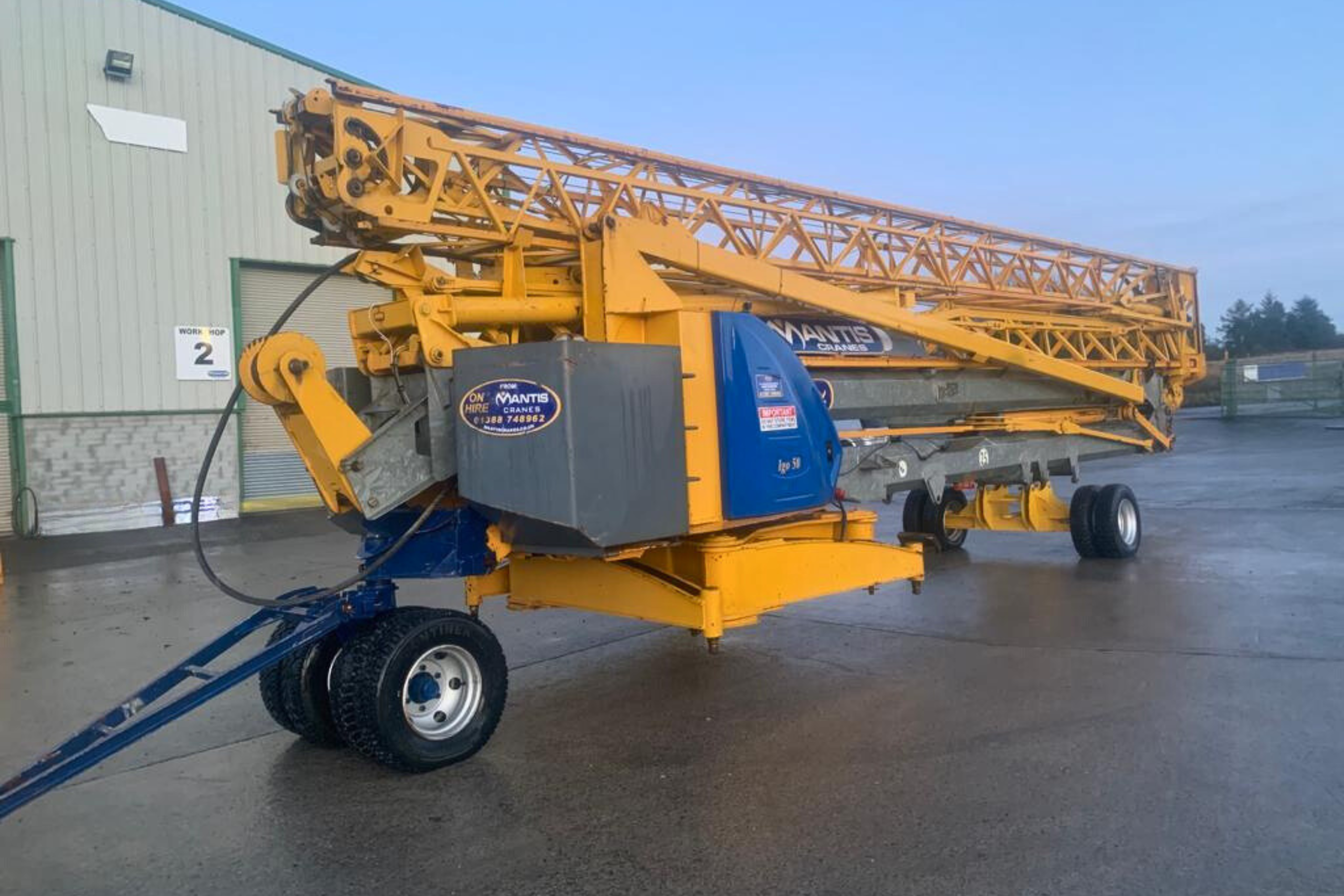 self erector A photo showing the compact size of a self erector for transport to site