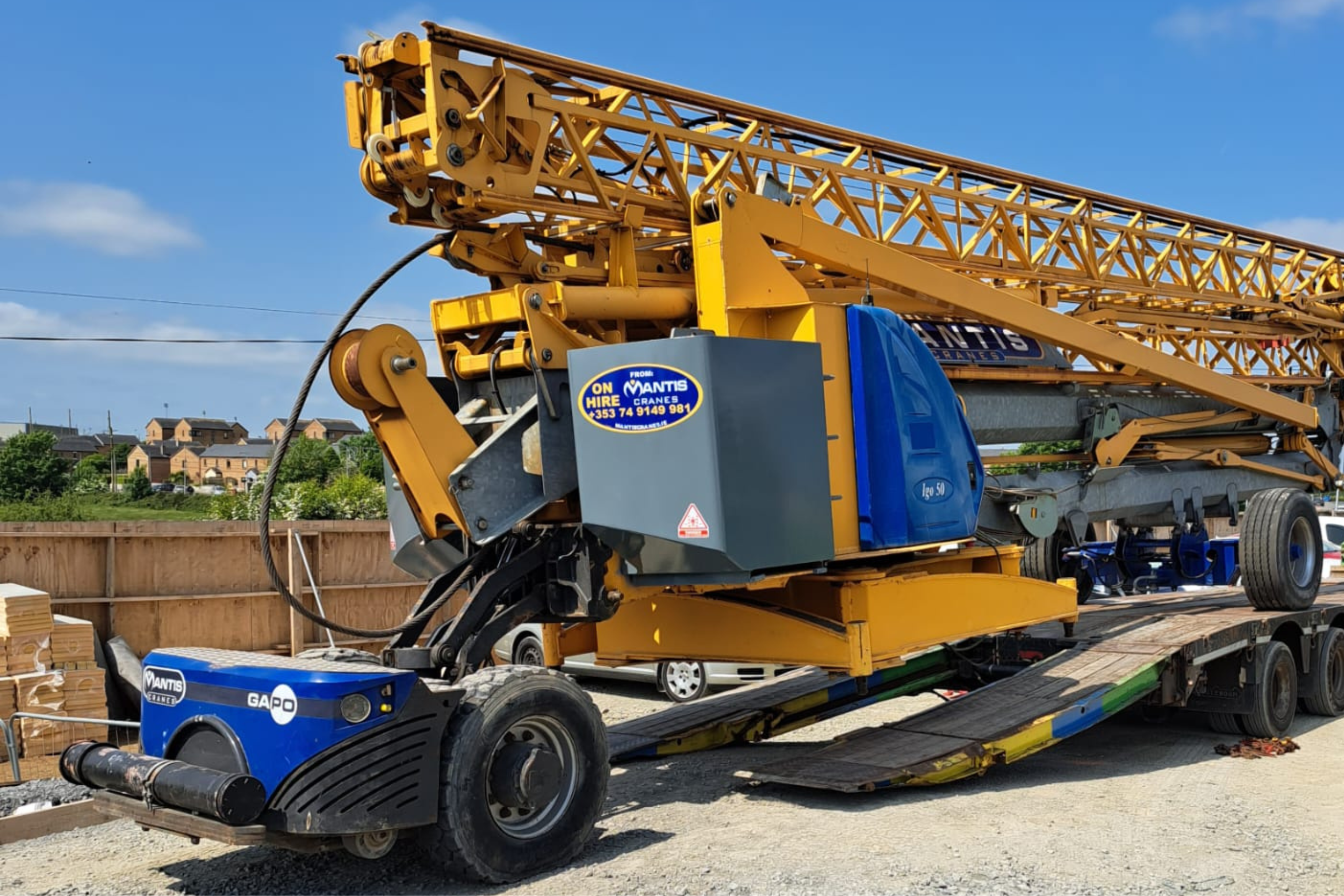 tower crane A photo of a tower crane being loaded using the GAPO crane mover