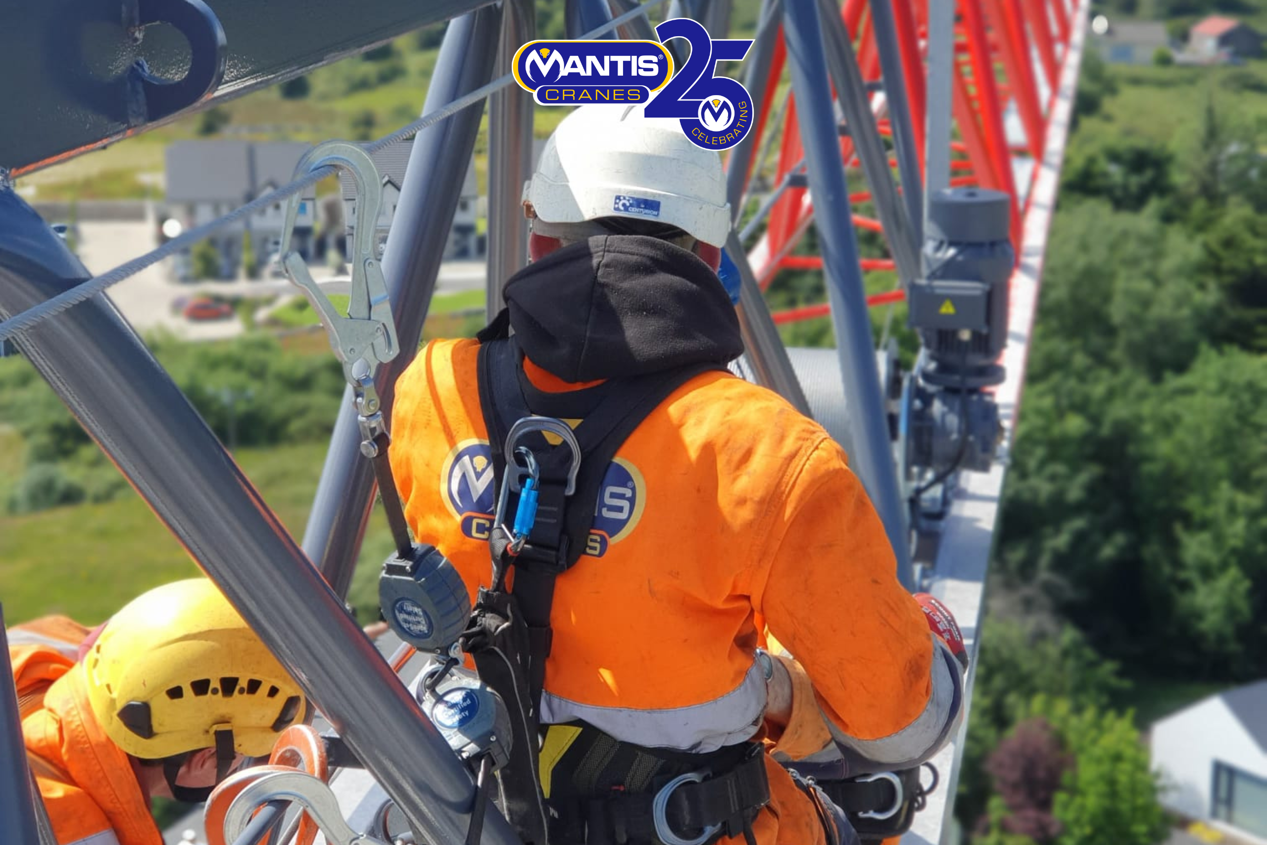 self erecting crane ireland A photo of Mantis Cranes engineers repairing a tower crane