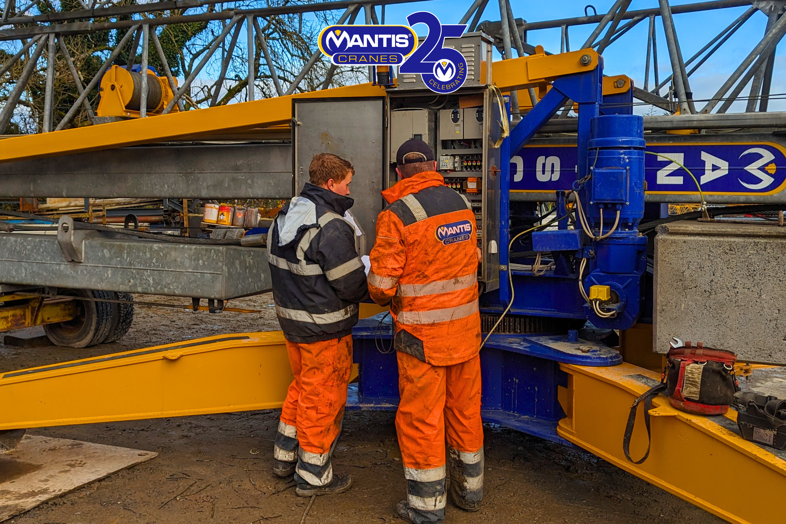 self erecting crane uk A photo of Mantis Cranes Engineers repairing a self erecting crane