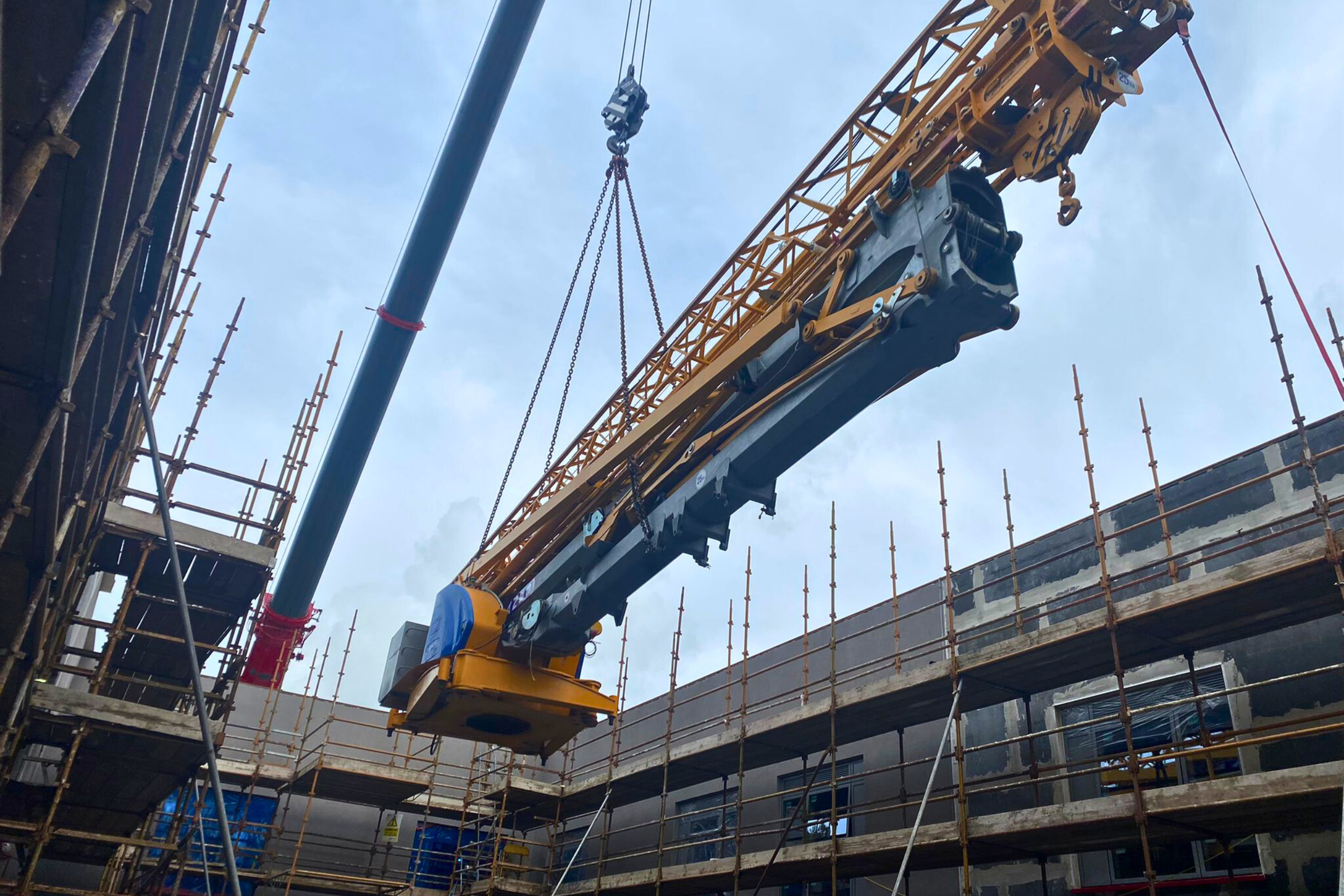 self erector hire A photo of a self erecting crane lift out